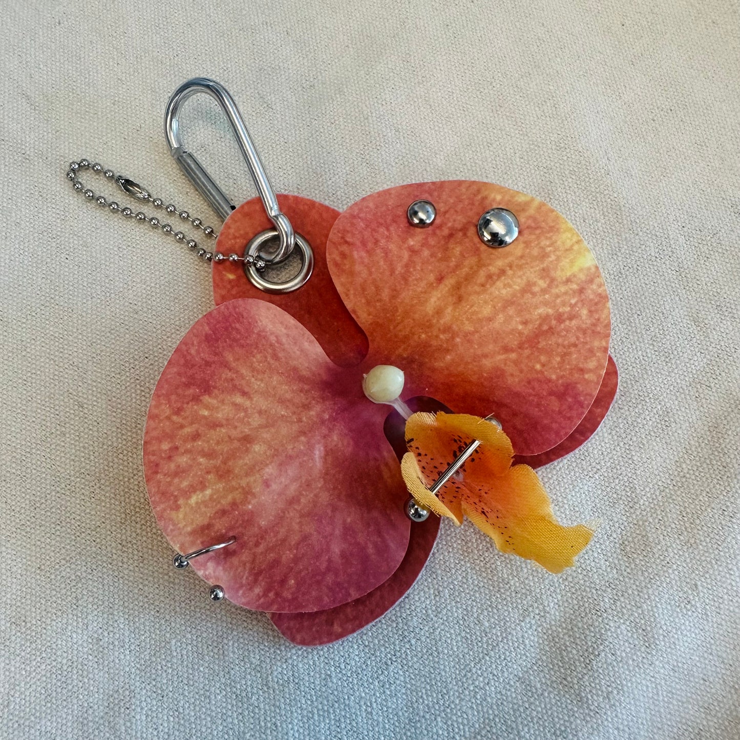 Pierced Orchid Bag Charm - Nectarine